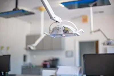 dental exam light in the treatment room of Sycamore Smiles in Fort Worth, TX